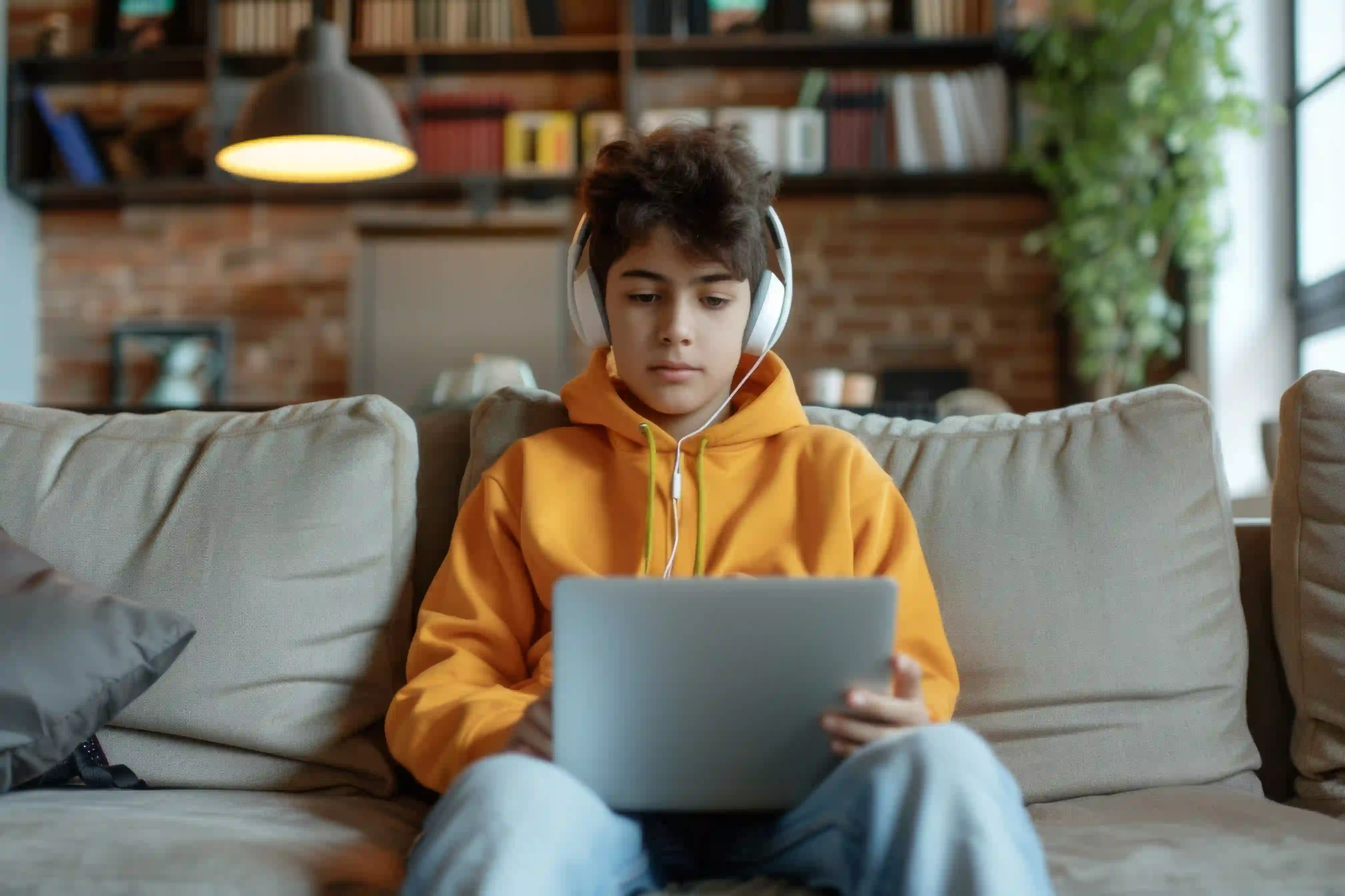 An NCEA Level 2 student studying during an online French tutoring session